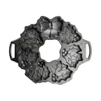 image of Lodge BWHW Holiday Wreath Pan – 7 Cakeletes, Uncoated Seasoned Cast Iron, Stove/Induction/Oven Safe