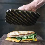 image of Lodge GP8-10001 Finex Grill Press, 8" Cast Iron, Pre-Seasoned, Coiled Spring Handle