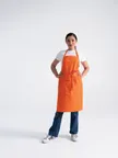 image of Chef Works F8-TAG-0 Bib Apron, Adjustable Neck Strap, 65% Poly/35% Cotton, Tangerine, 35" x 21"-24"
