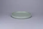 image of RAK Porcelain NOLD23SAQ - 9" Round Rimless Aqua Green Ceramic Plate, Dishwasher Safe - 6/Case