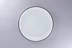 image of RAK Porcelain ONPR27CD25147 Coupe Plate, 10.66" Dia x 1.05" H, White/Black Rim, Porcelain - 12/Case
