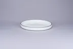 image of RAK Porcelain PLNOLD23CD25147 Rimless Plate, 9.1" Round White with Black Rim, Porcelain - 1/Case