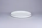 image of RAK Porcelain PLNOLD27CD25147 - Round 10.62" Stackable Rimless Plate, White Black Rim, Porcelain