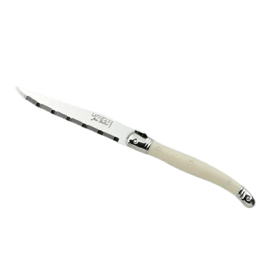 Steelite 5393S057 - 9" Serrated Steak Knife, 1.2 mm 13/0 Blade, Ivory Handle, Stamped, 8-9" - 6/Pack