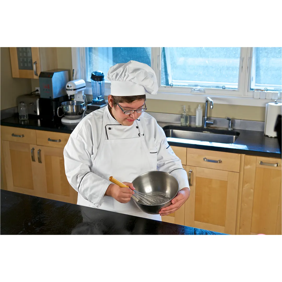 Mercer M62095WBM Women's Chef Coat, White 65/35 Poly/Cotton Twill, 12 Black Buttons, Side Slits