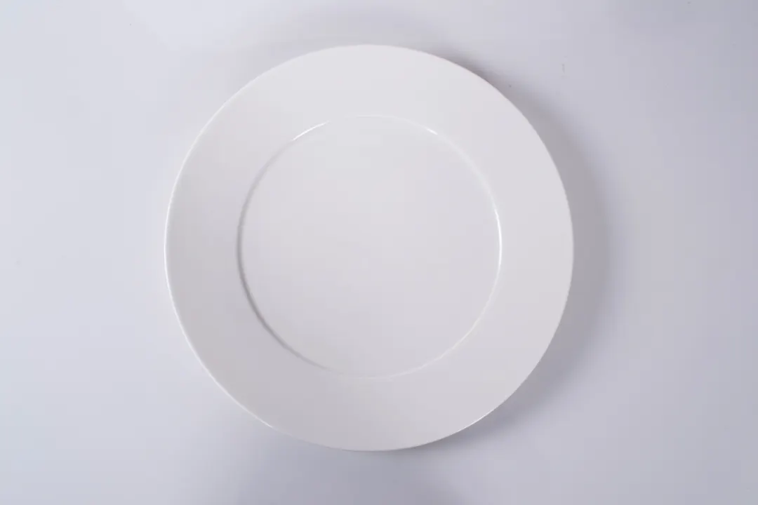 Ariane Porcelain ALGARN000011022 Legacy Plate, 8 2/3" Flat, Warm White, Porcelain - 12/Case
