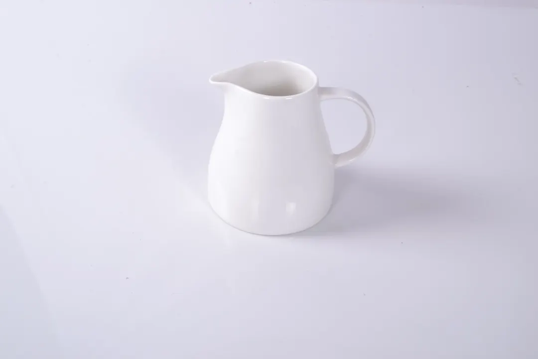 Ariane Porcelain ALGARN000064025 Creamer Pitcher, 8 4/9 Oz Warm White Porcelain With Handle - 6/Case
