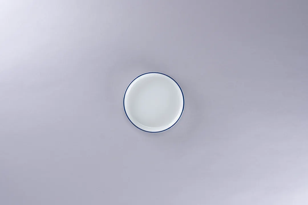 RAK Porcelain PLNOLD11CD25145 Round Porcelain Plate 4.125" White with Blue Rim Flat Edge - 12/Case