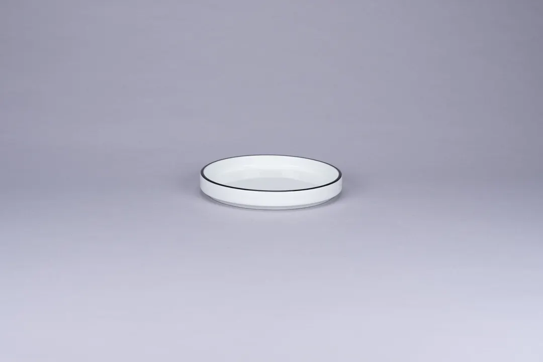 RAK Porcelain PLNOLD14CD25147 - 5.5" Round Plate, White with Black Rim, Flat Edge, Stackable - 12/Case