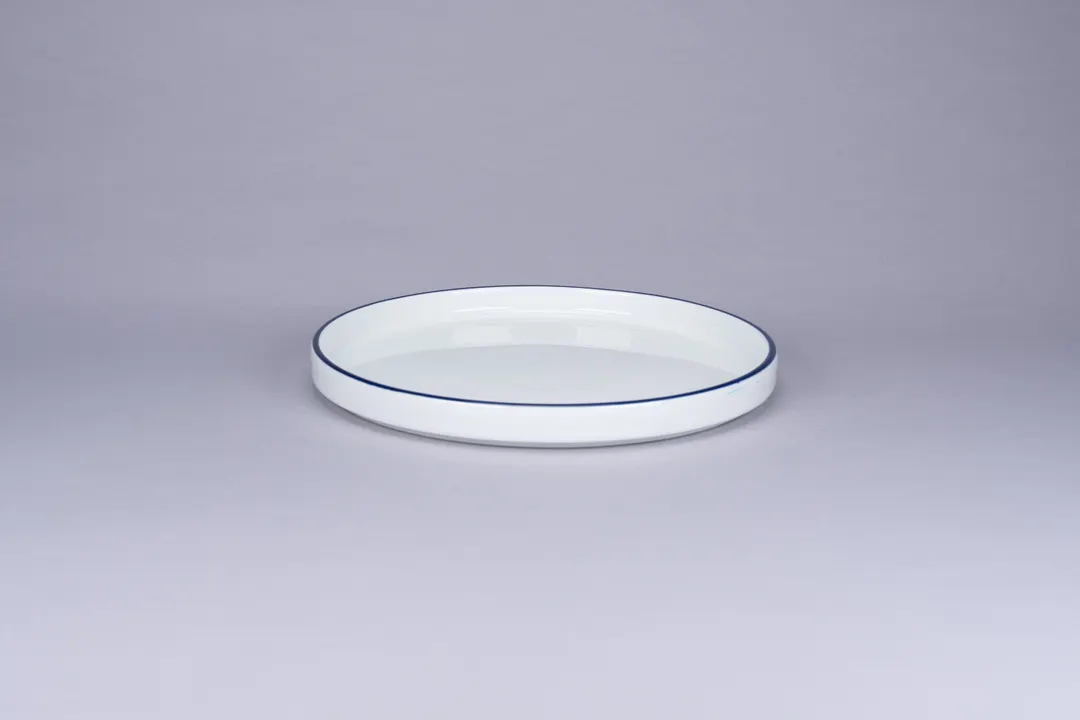 RAK Porcelain PLNOLD23CD25145 Stackable Rimless Plate, 9.1" Round Blue Rim, Porcelain - 12/Case