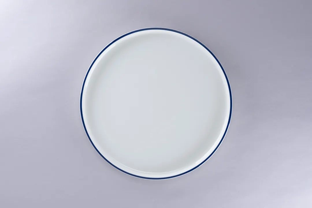 RAK Porcelain PLNOLD27CD25145 - 10.62" Rimless Porcelain Plate, White with Blue Rim - 1/Case