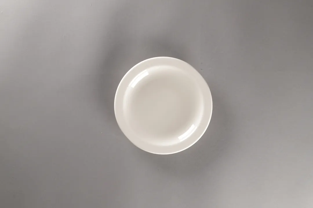 RAK Porcelain YONCP16 - 6.57" Round Coupe Rim China Plate, Porcelain, American White, 12/Case