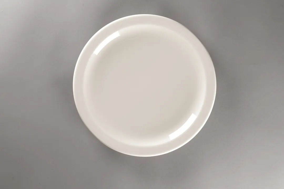 RAK Porcelain YONCP25 - 9.97" Porcelain Plate, Rolled Edge, Narrow Rim, American White - 12/Case