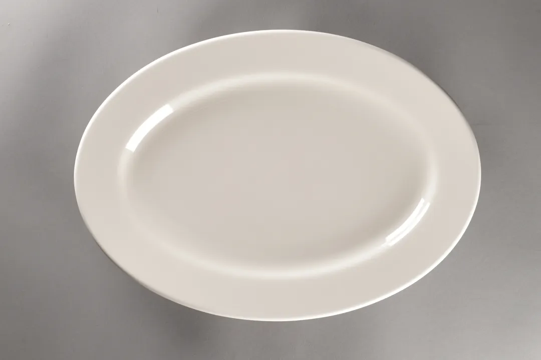 RAK Porcelain YOOP32 Oval Platter, 12.57" x 9.02" Porcelain, White, Rolled Wide Rim - 6/Case
