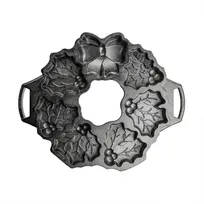 product of Lodge BWHW Holiday Wreath Pan - 7 Cakeletes, Uncoated Seasoned Cast Iron, Stove/Induction/Oven Safe