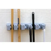 product of Carlisle 4073700 Roll N Grip Broom/Brush Holder, 16-1/2" L x 5" W x 3-1/2" H, Blue ABS Plastic - 1/Each