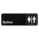 Winco SGN-362 White Imprint on Black 3" x 9" Spanish Restrooms Information Sign 1 image