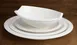 Winco WDP006-205 Bergomi 11" Oval Narrow Rim Porcelain Bowl, 14 oz Creamy White - 12/Case 2 image