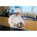 Mercer M62095WBM Women's Chef Coat, White 65/35 Poly/Cotton Twill, 12 Black Buttons, Side Slits 2 image